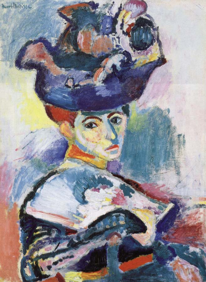 The woman wearing a hat